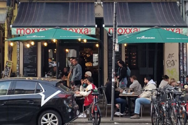 German Business Awnings That Shade Guests and Produce Electricity