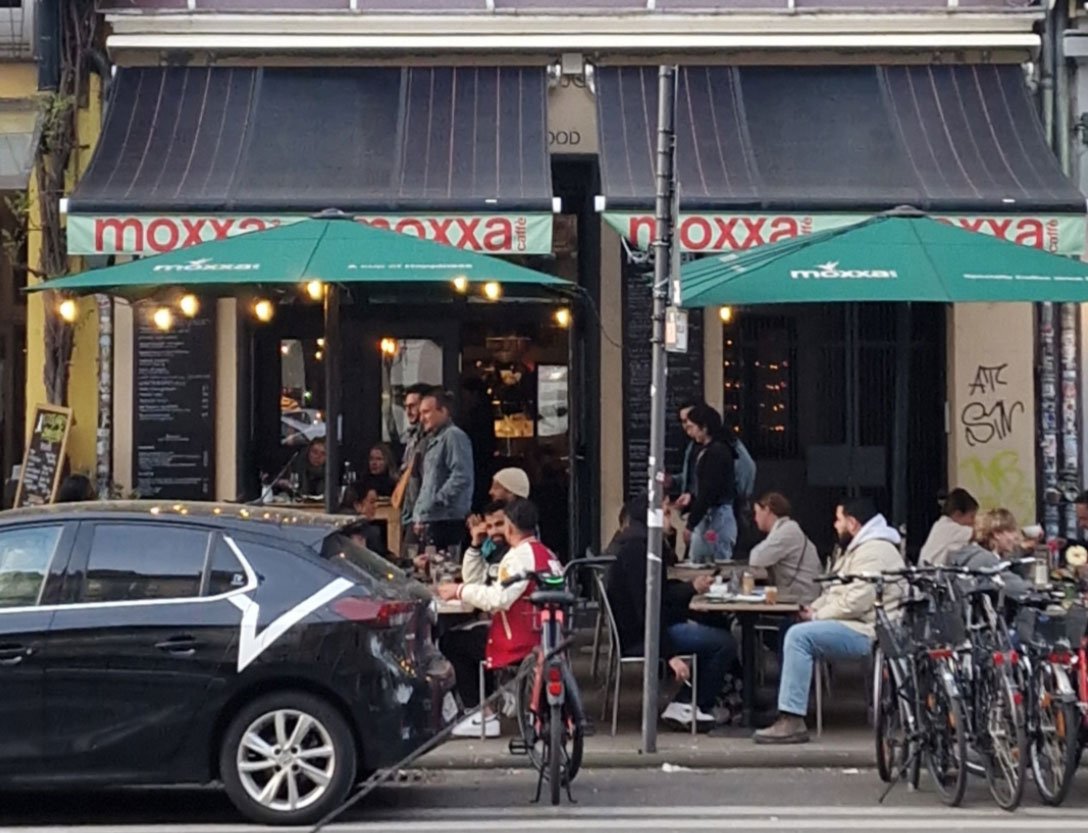 German Business Awnings That Shade Guests and Produce Electricity